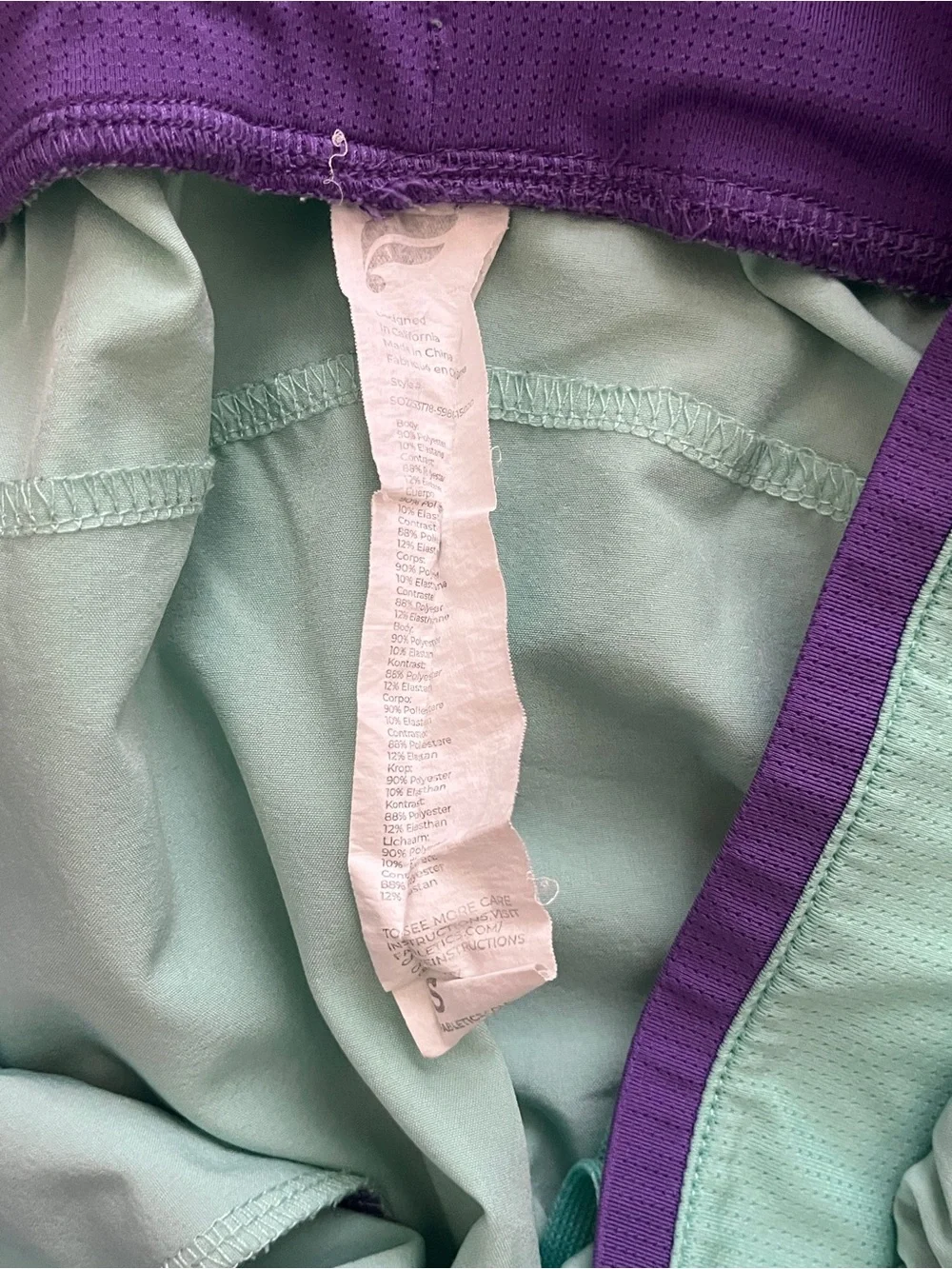 Fabletics Men's Mint Athletic Shorts with Purple Waistband
